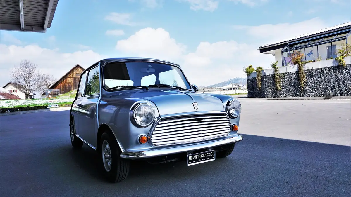 Classic green Mini car similar in style to the one driven by Mr. Bean