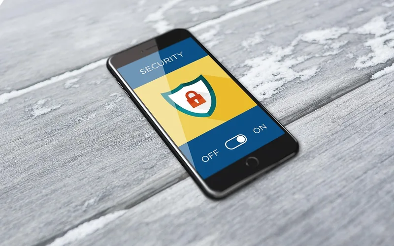 Smartphone showing a security shield icon with an Off and On switch