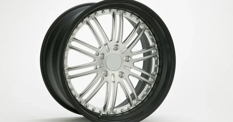 Chrome alloy wheel rim showing the lug bolt pattern
