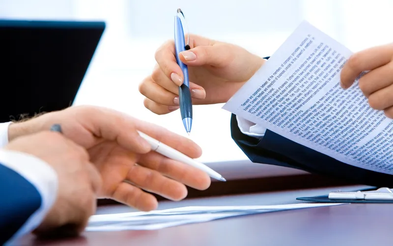 Filling out DMV vehicle ownership record request paperwork