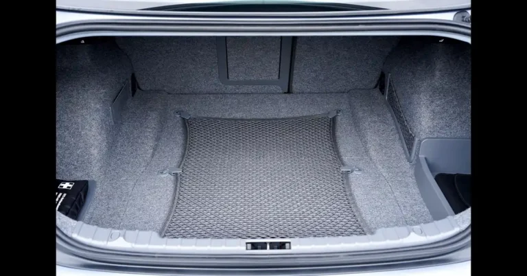 Empty car trunk cargo area with cargo net installed