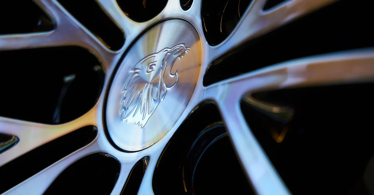 Close-up of a polished aftermarket alloy wheel, the type of upgrade wheel used on a Ford Lightning