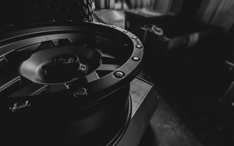 Truck wheel removed in a repair shop for suspension and alignment work