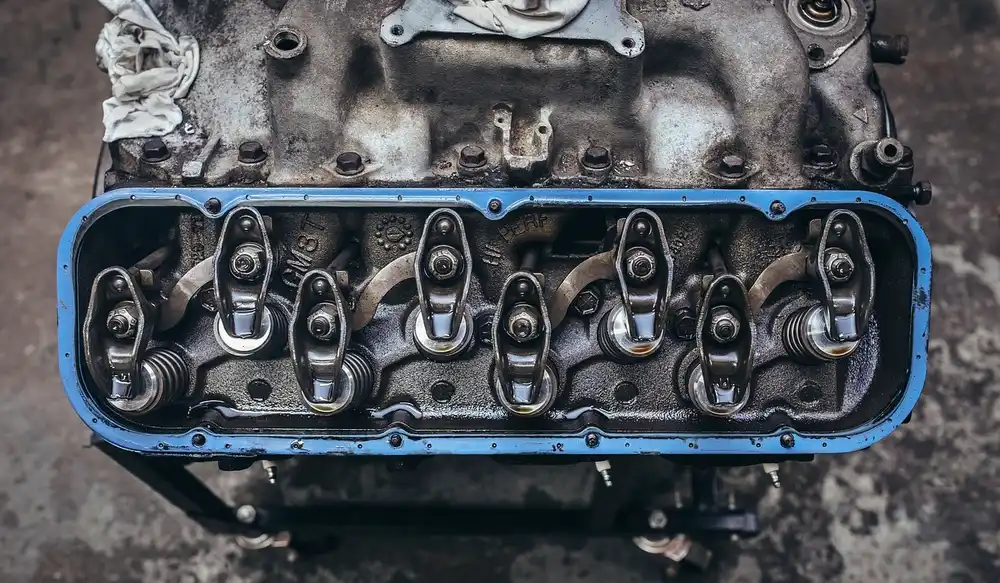 Exposed valve train and rocker arms showing where engine oil viscosity affects lubrication