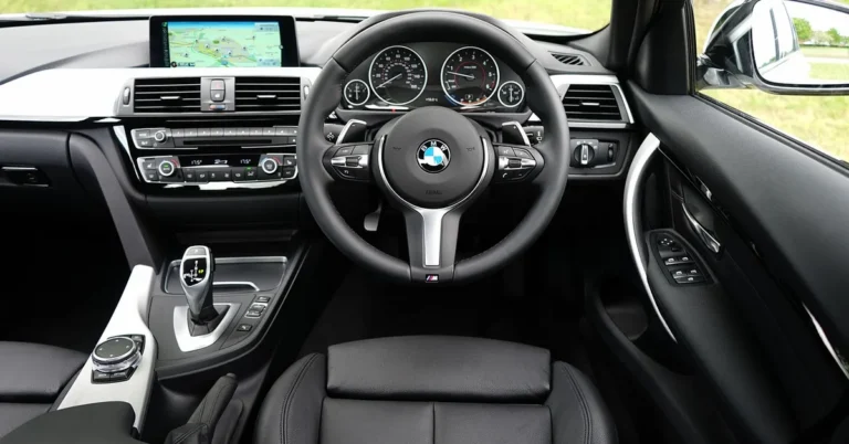 BMW dashboard and steering wheel showing the interior trim compared in Sensatec vs leather