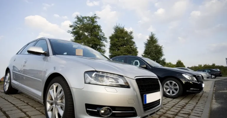 Rows of cars for sale on a dealership lot