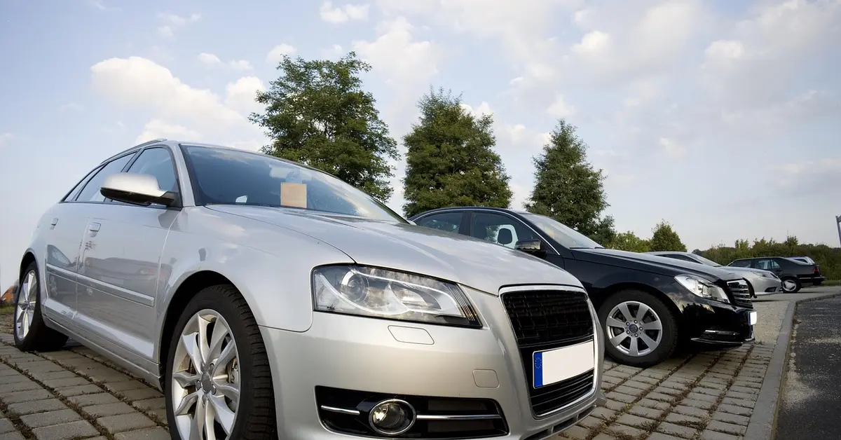 Rows of cars for sale on a dealership lot