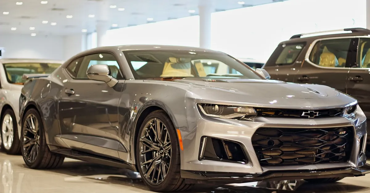Chevrolet Camaro ZL1 front three-quarter view in showroom