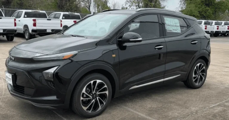Black Chevy Bolt EUV parked at a dealership lot