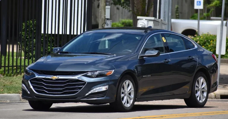 Chevy Malibu sedan front three-quarter view parked on street