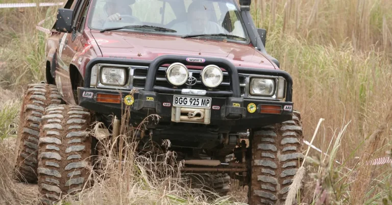 Toyota off-road truck with knobby tires and visible badge