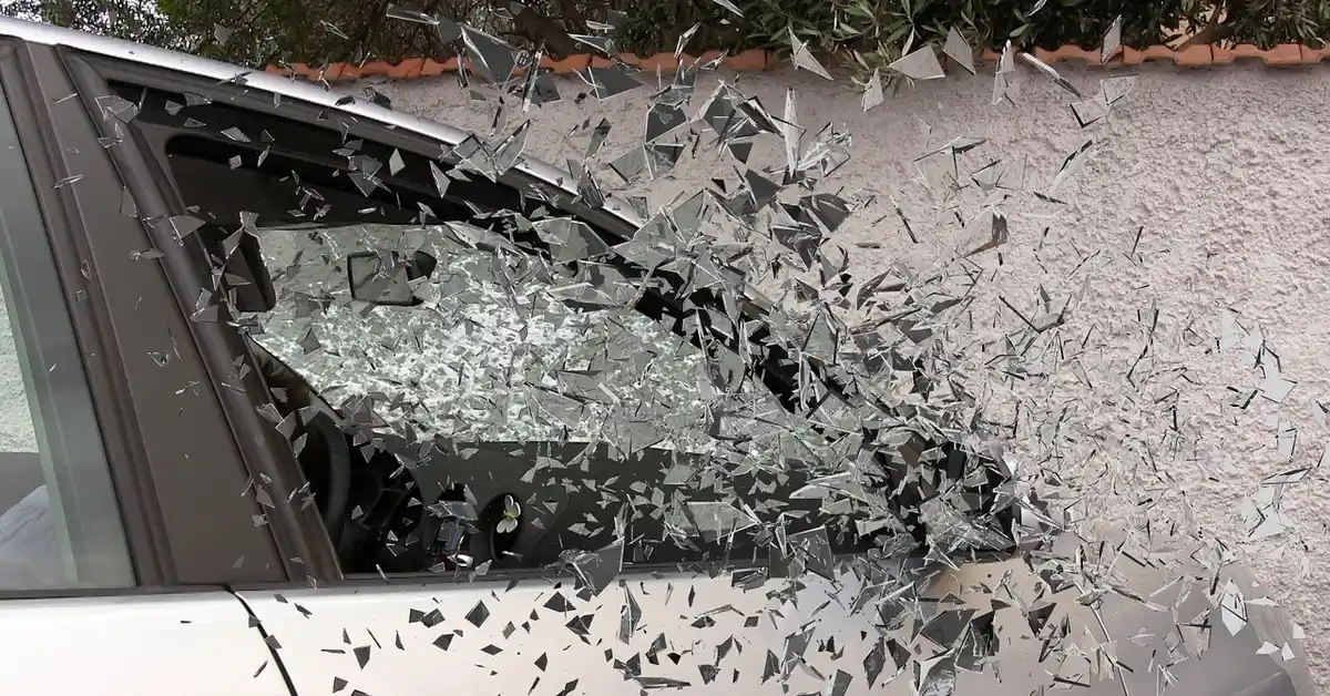 Car window shattered by vandalism