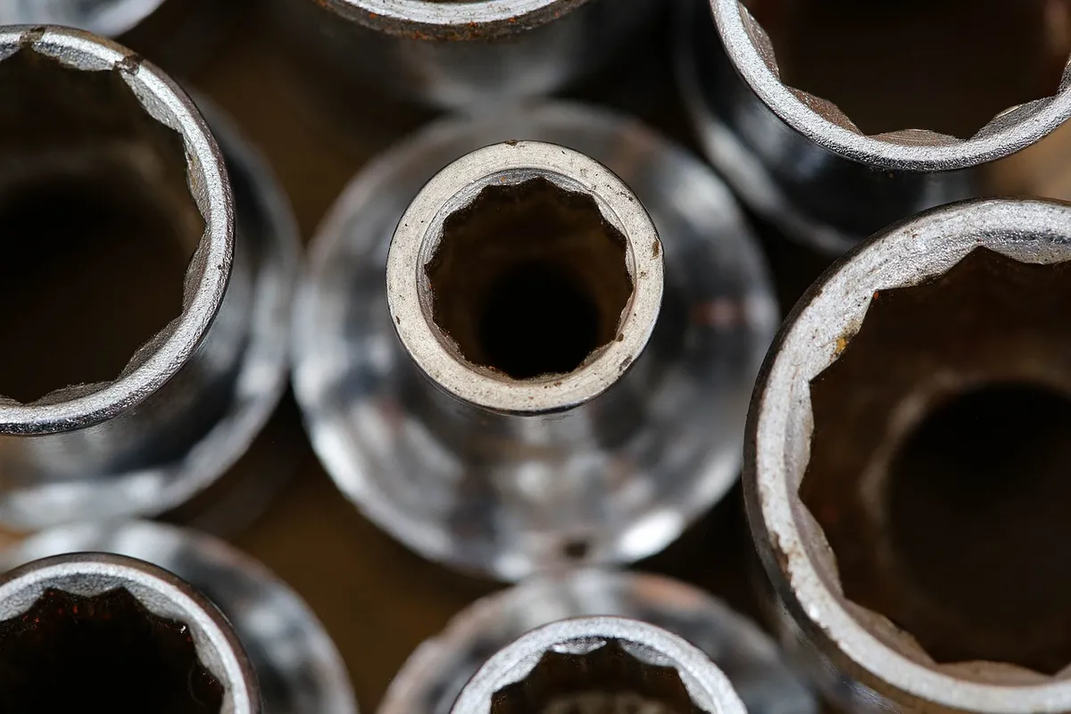 Close-up top view of metal socket wrench heads