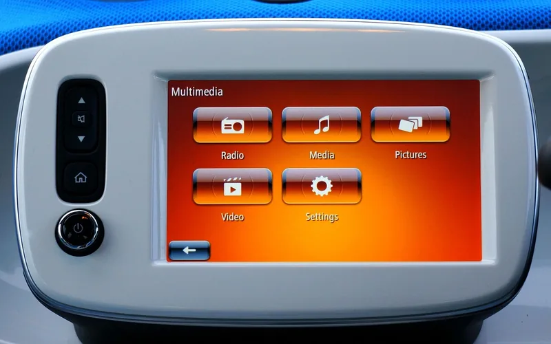 Car infotainment multimedia menu with a Settings icon