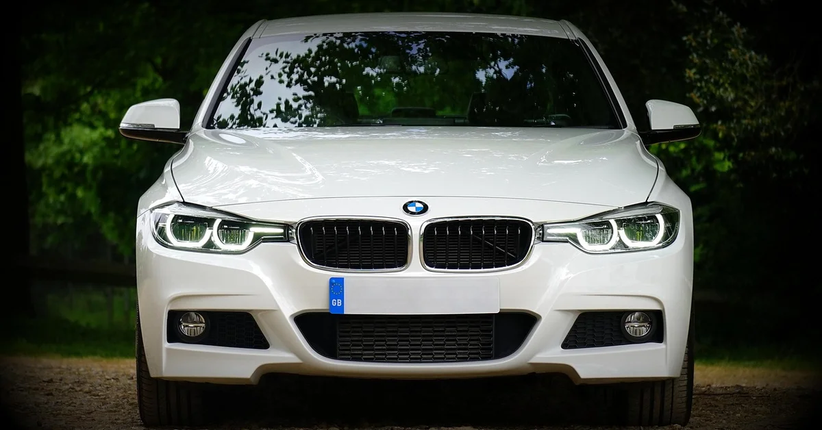 White BMW 3 Series front view with grille and headlights
