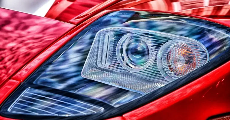 Close-up of a car headlight housing on the front of a vehicle