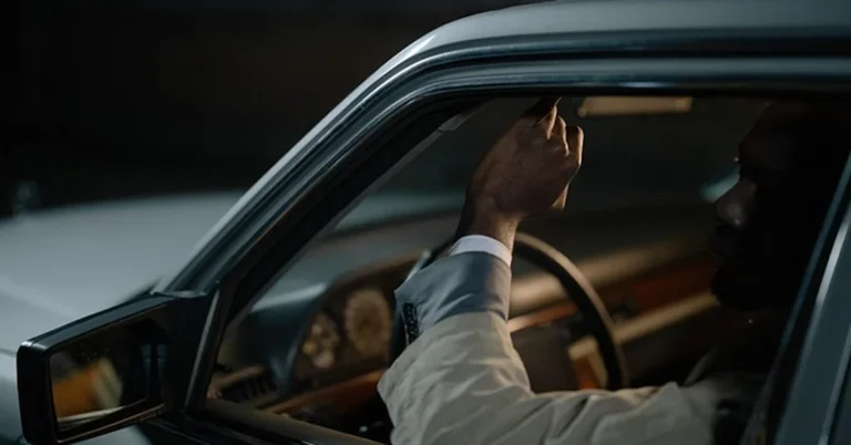 A driver behind the wheel of a car, relevant to using a rental car for DoorDash delivery