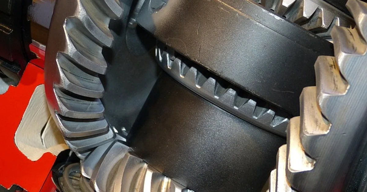 Close-up of a transmission gear assembly, relevant to checking and adding transmission fluid