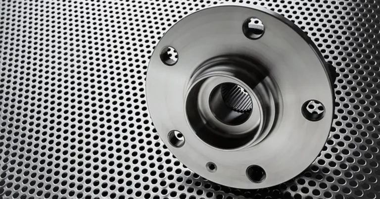 Close-up of a wheel hub and suspension component, relevant to lift kit installation on a Ford F-150 Lightning