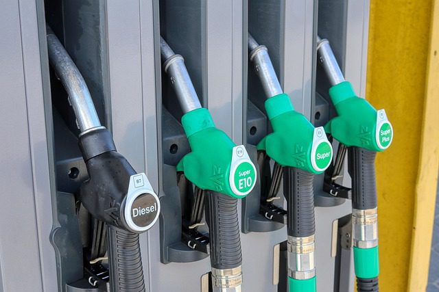 Manual fuel siphon pump and hose used to drain fuel from a vehicle tank