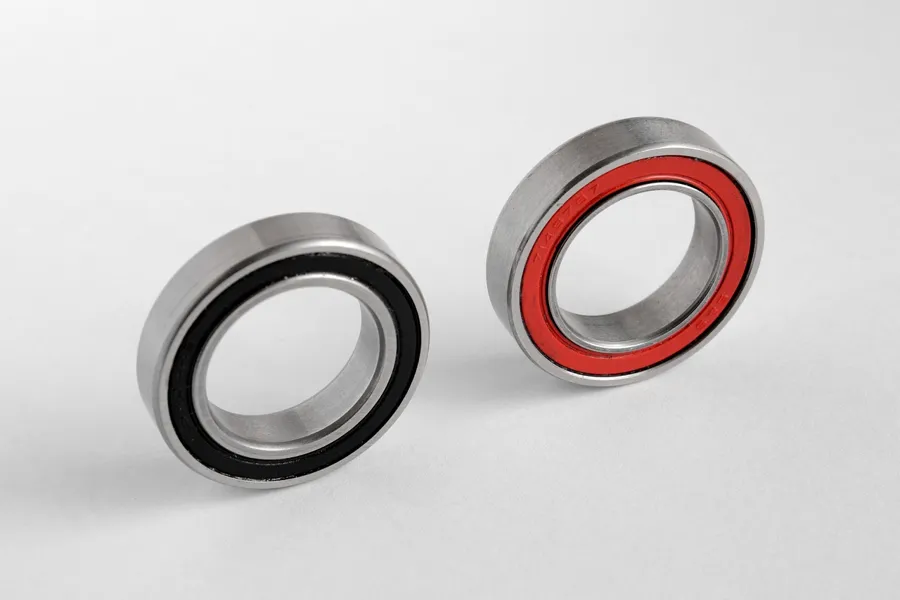 Two ball bearings on a white background