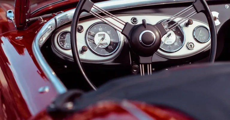 A classic car steering wheel and interior showing personalization