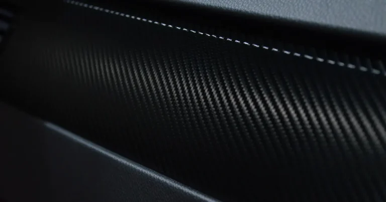 A vinyl wrap being applied to a car as a customization example