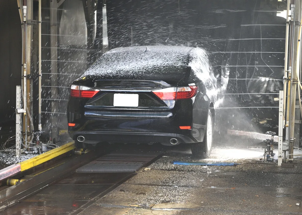Foaming car wash soap being applied to a vehicle