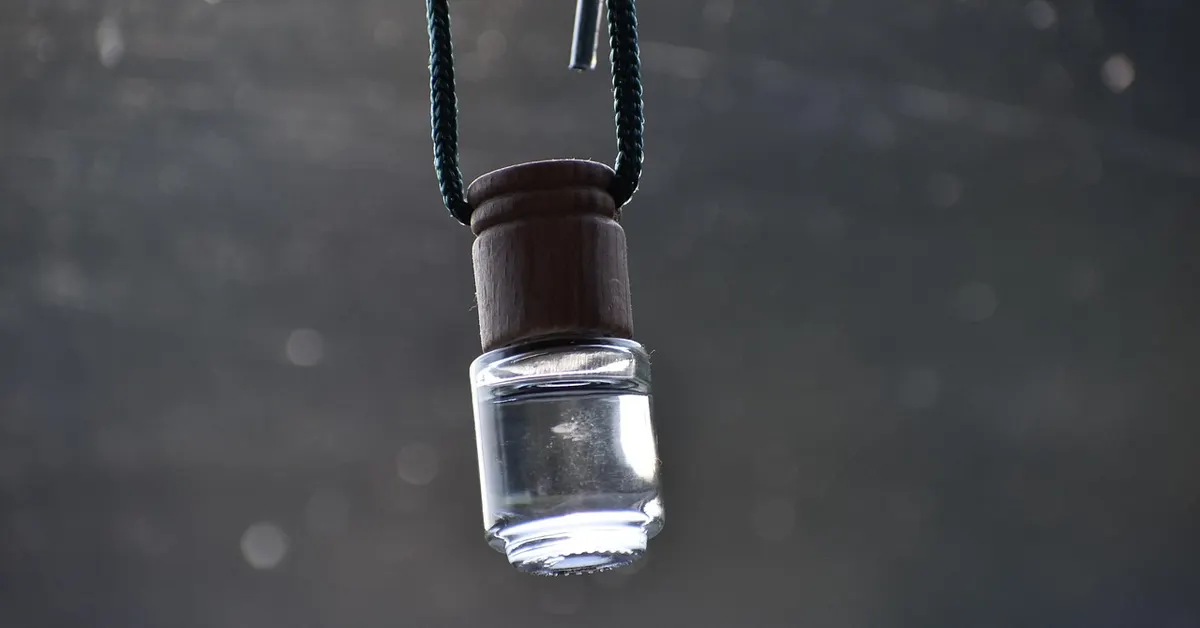 An air freshener hanging inside a car interior