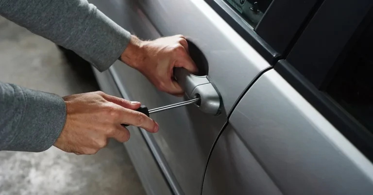 A break-in attempt on a parked car at night