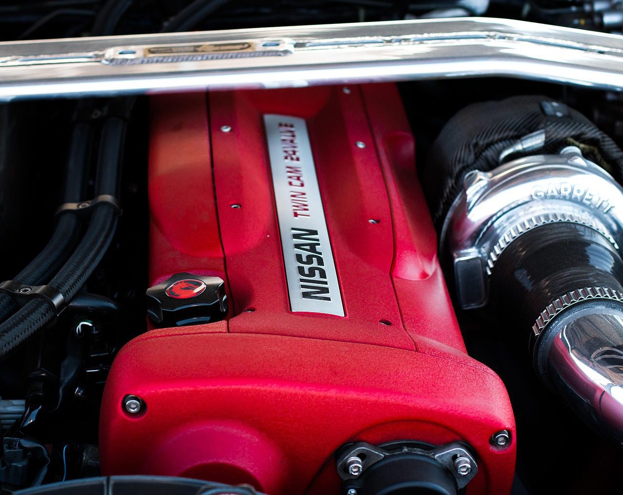 A modified performance engine bay set up for forced induction and power-adder upgrades