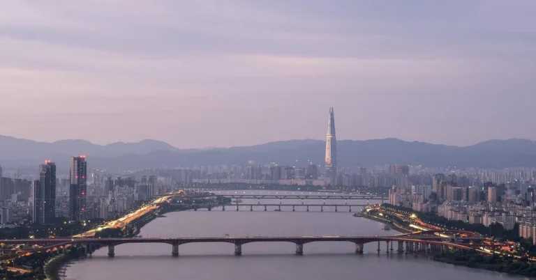 Seoul skyline and Han River bridges at dusk