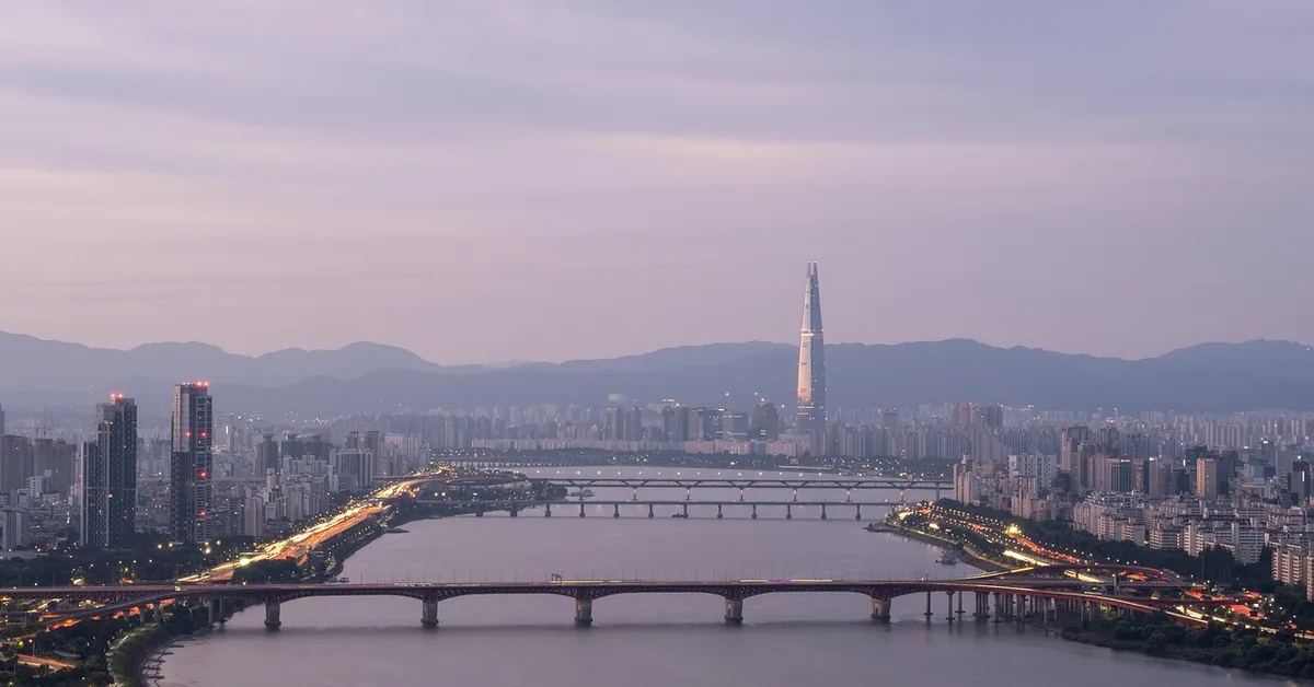 Seoul skyline and Han River bridges at dusk