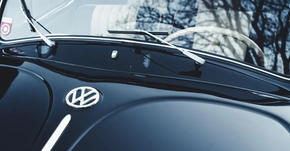 A vintage car emblem and logo badge