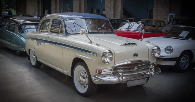 A vintage limousine displayed at a classic car show
