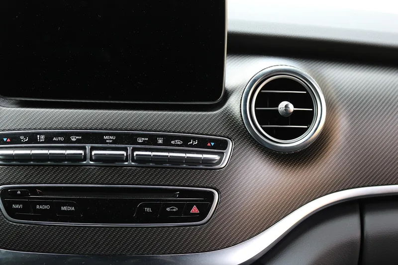 Built-in car center display above the climate and media control buttons