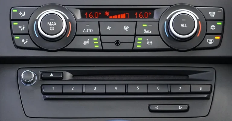 Car climate control panel with AC dials, fan buttons and temperature display