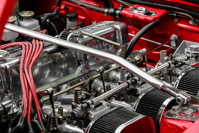 Mechanic performing engine maintenance and carbon cleaning