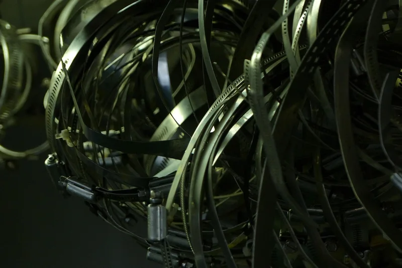 Pile of stainless steel hose clamps in different sizes