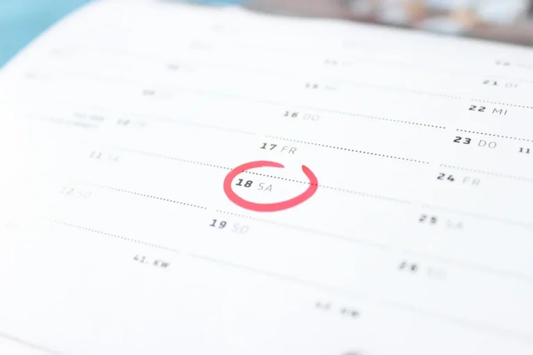 Wall calendar page with one date circled in red marker