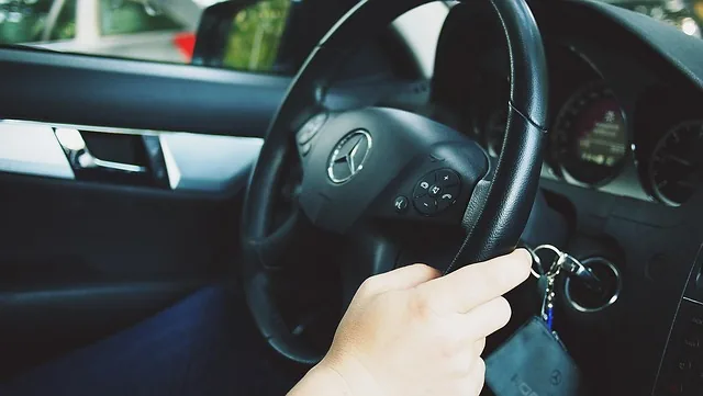 Driver behind the wheel providing a courtesy ride