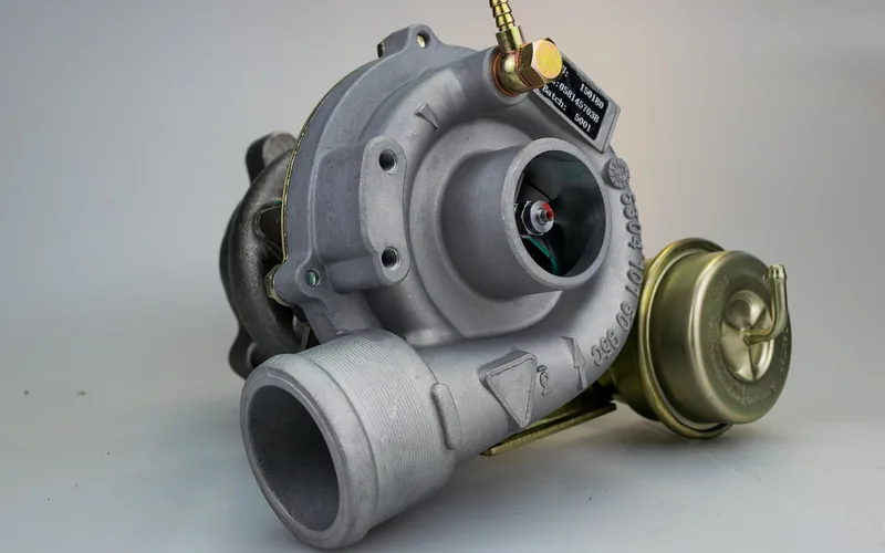 Turbocharger mounted on a small turbocharged engine, the type affected by a P0299 underboost code
