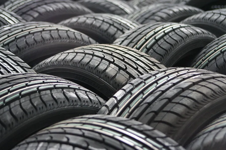 Stacked car tires showing their tread
