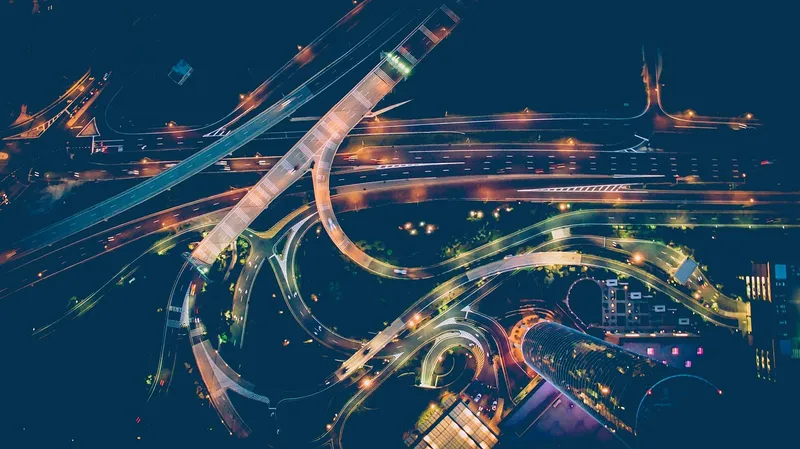 Aerial view of a lit highway interchange at night Aerial view of a lit highway interchange at night