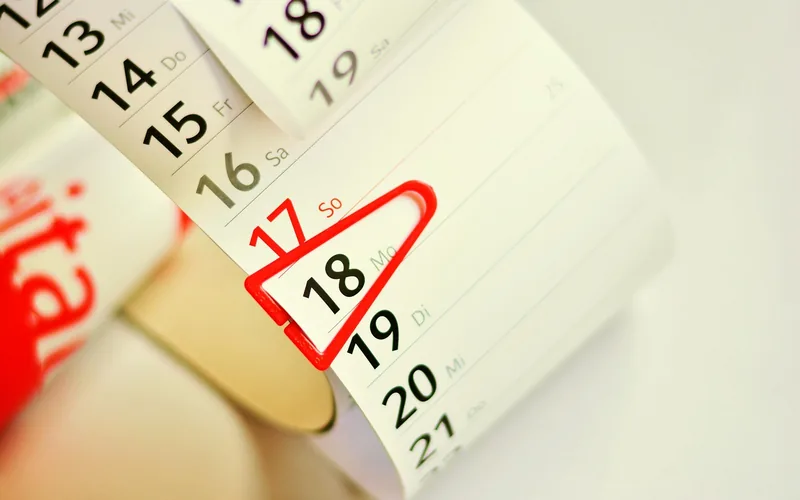 Desk calendar page with one date circled in red