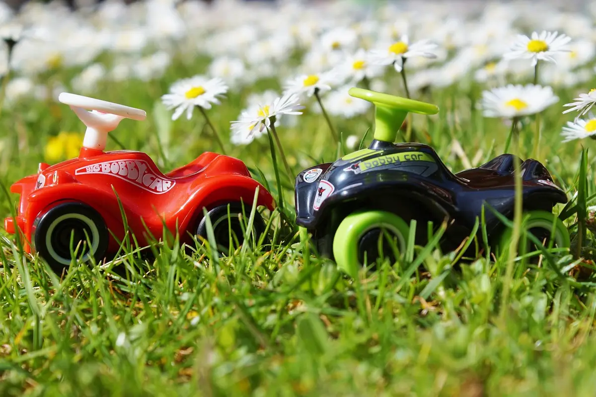 The Cars franchise release pattern points to a realistic 2028-2029 window Red toy race car representing the Cars movie franchise