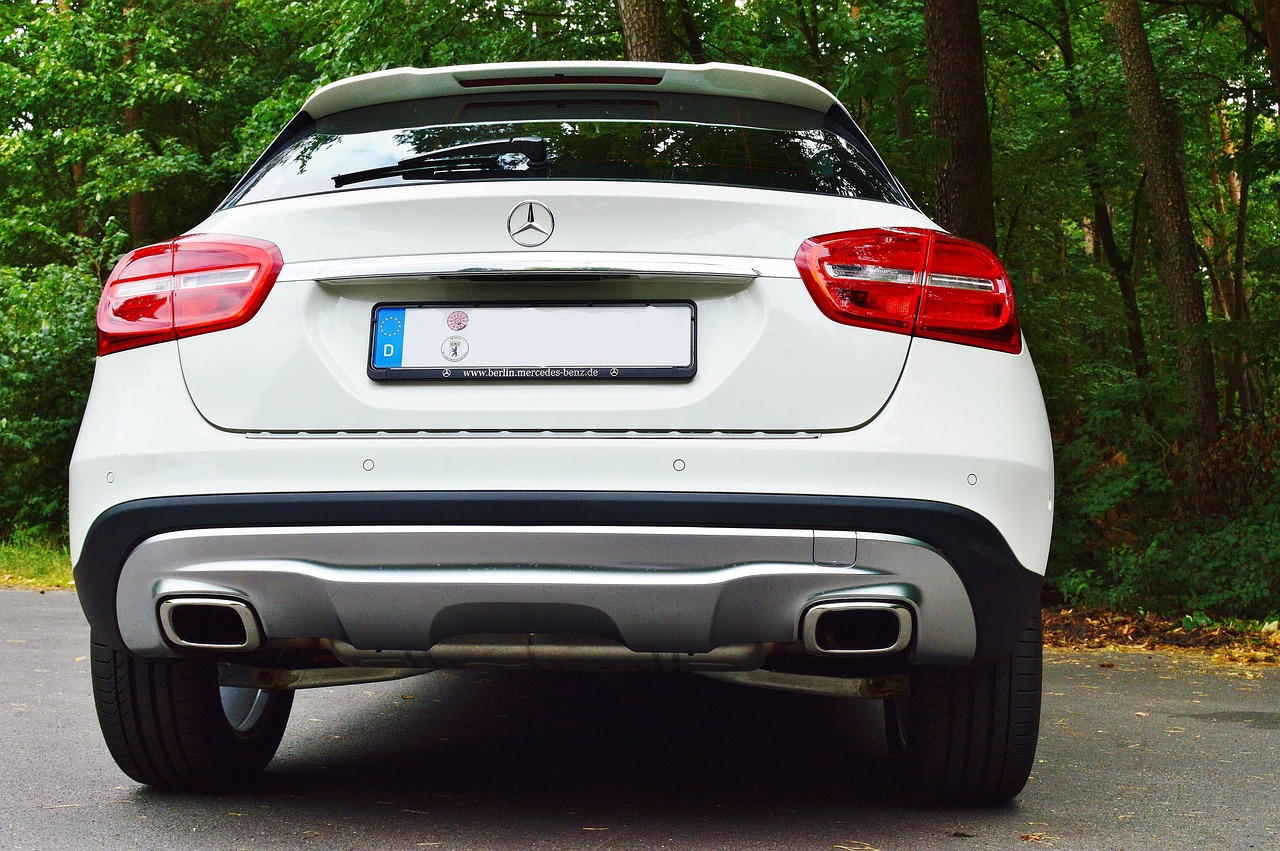 SUV rear liftgate open showing upward swing design
