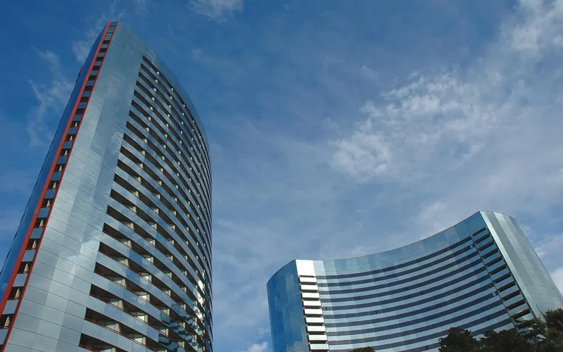 Modern corporate office building representing a privately held parent company headquarters Modern corporate office building representing a privately held parent company headquarters