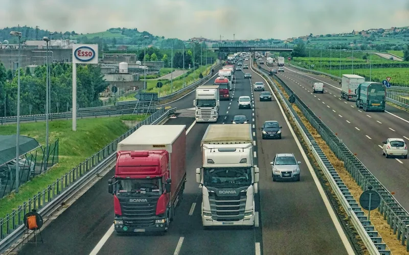 Busy highway filled with traffic, representing the global scale of car ownership Busy highway filled with traffic, representing the global scale of car ownership