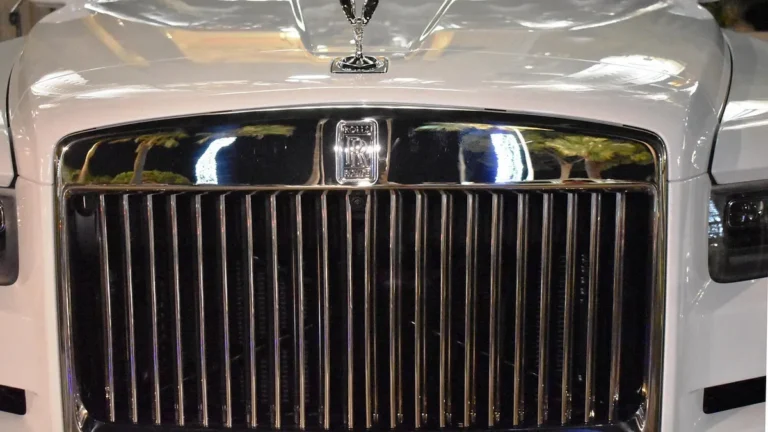 White Rolls-Royce front grille with Spirit of Ecstasy hood ornament